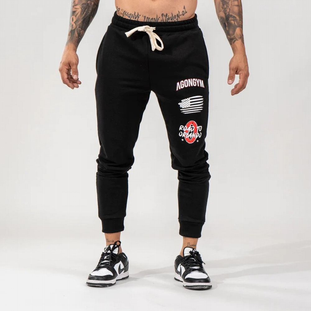 AGONGYM MUJER TOP PULSE BLACK T-S